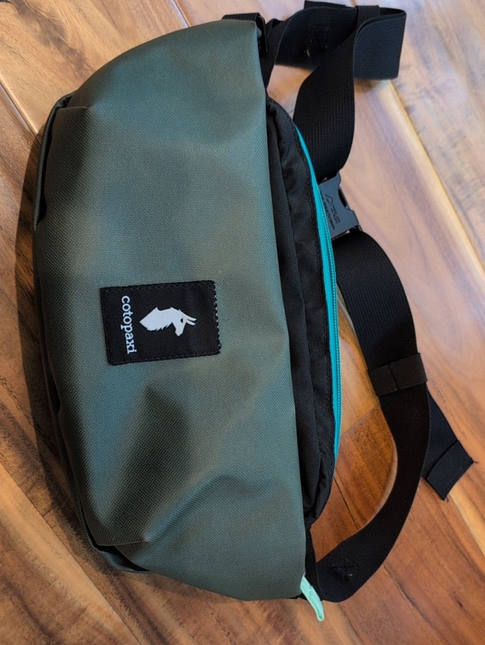 Cotopaxi Coso Olive Green Belt Pack with Aqua Zipper